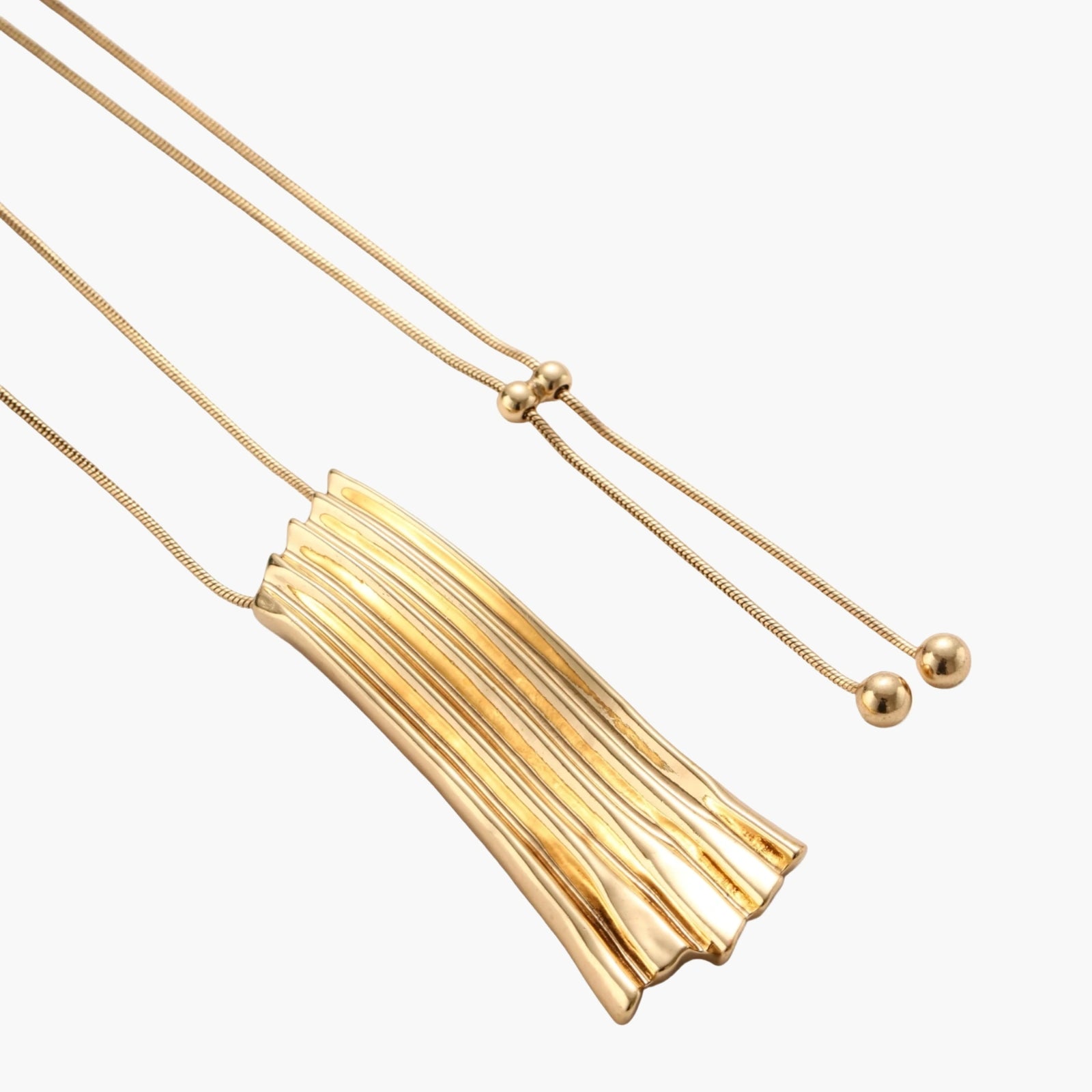 Modern adjustable necklace featuring geometric ribbed pendant with vertical lines in gold and silver finish options.