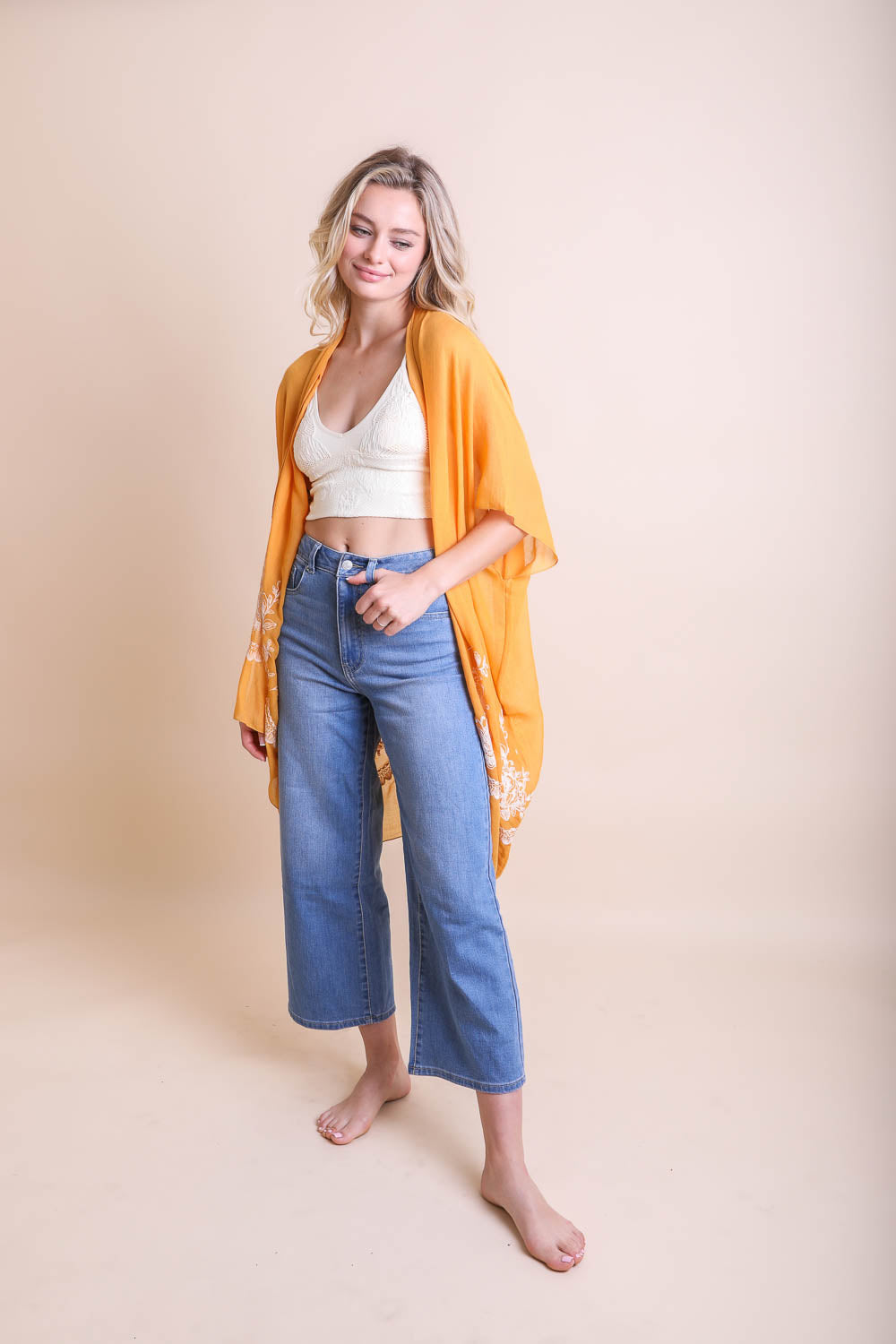 Elegant embroidered mustard floral kimono for casual and formal looks.