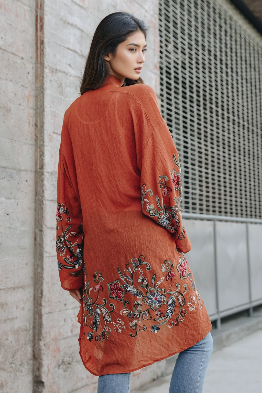 Stylish rust floral print kimono cardigan with breathable fabric.